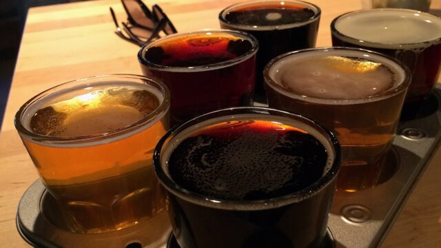 A flight of craft beers at a brewery taproom, May 2014; an illustration, not taken at 33 Acres Brewing Company.