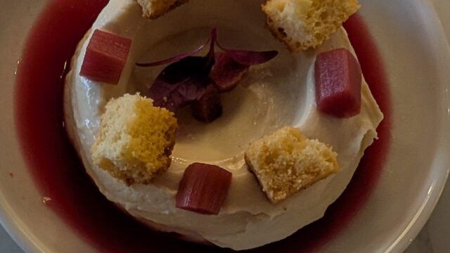 A mango ice cream dessert served at Calcutta Cricket Club in Calgary.