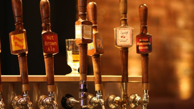 A row of draught beer taps at a bar in Montreal; an illustration, not taken at Central.