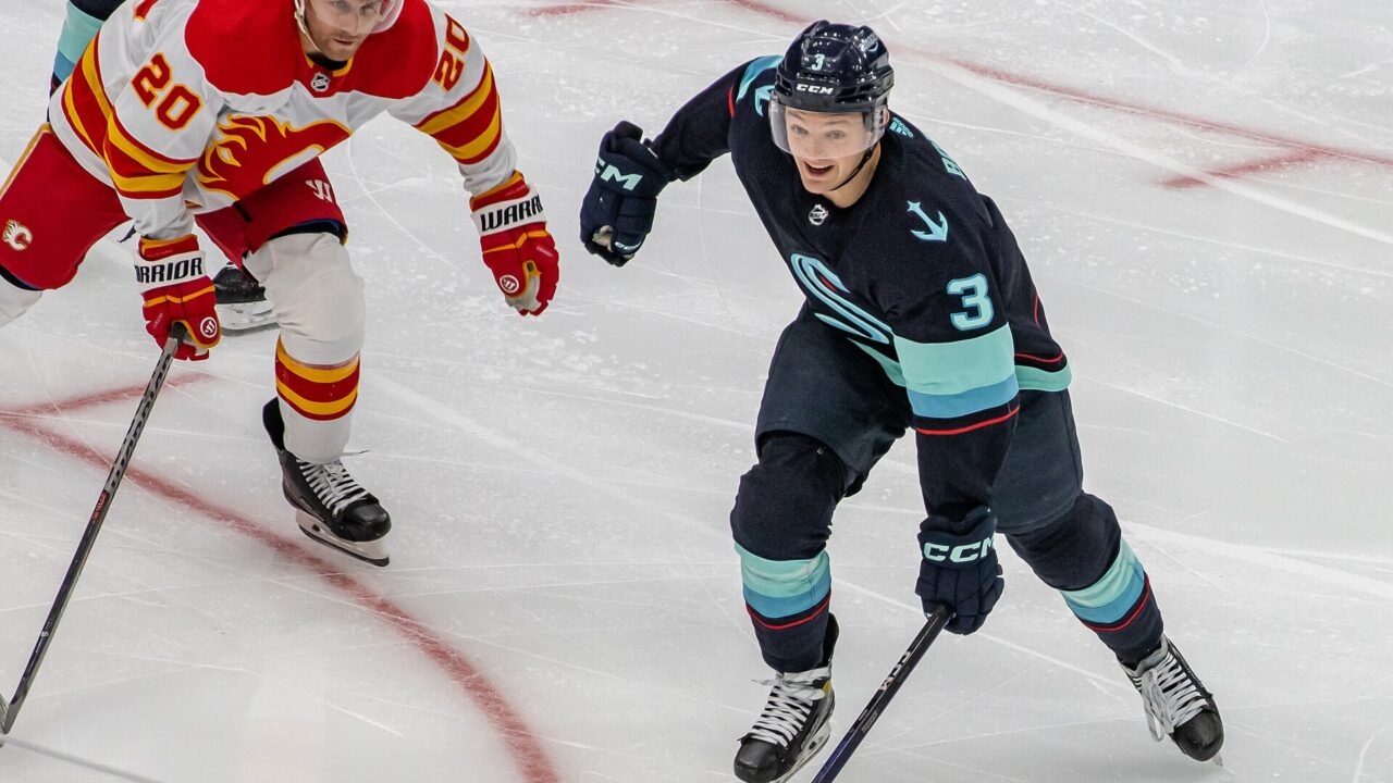 Calgary Flames and Seattle Kraken players in an NHL game in Seattle on December 28 2022.
