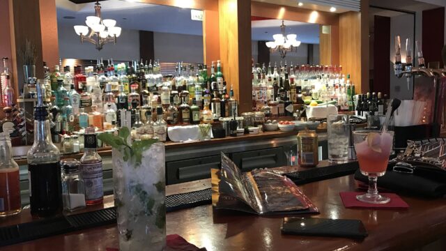 The interior of a cocktail bar in England; an illustration, not taken at Shelter.