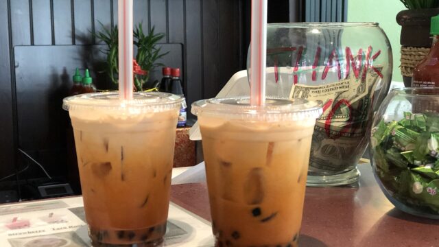 Two glasses of Thai iced bubble tea, 2019; an illustration, not taken at Thé Moon Tea House.