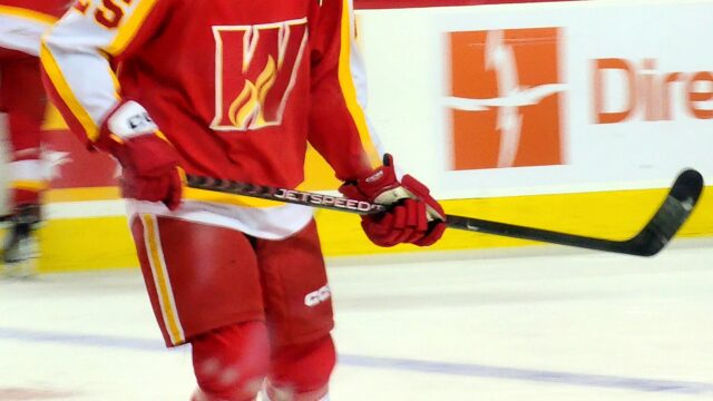 A Calgary Wranglers defenceman skating in warm-ups before an AHL playoff game against the Abbotsford Canucks at the Saddledome on April 28 2023.