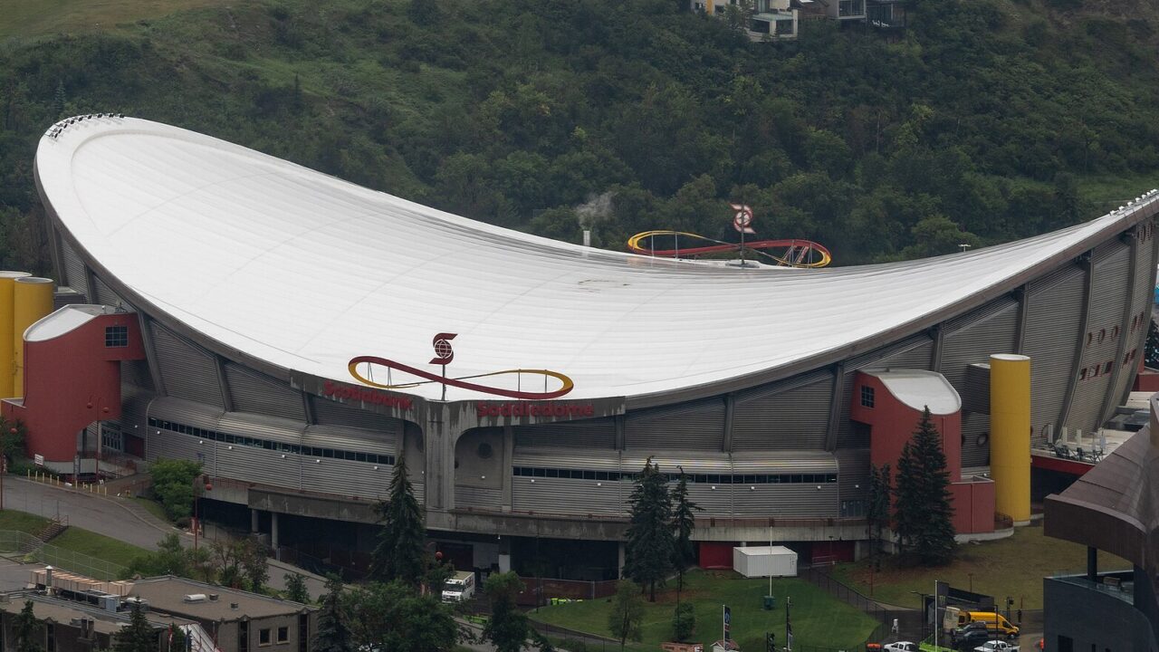 The Scotiabank Saddledome and part of the Stampede Park grounds seen from above, from the Calgary Tower observation deck in July 2025.