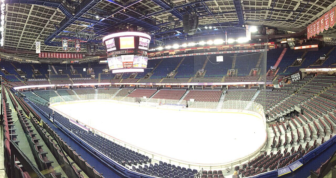 The empty seating bowl and ice surface inside the Scotiabank Saddledome, seen from an upper-level aisle in January 2015.