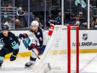 Columbus Blue Jackets and Seattle Kraken players in action during an NHL game in Seattle on January 28 2024.