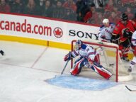 New York Rangers and Calgary Flames players in action during an NHL game in Calgary on January 2 2008.
