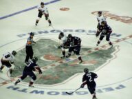 A faceoff between the Calgary Hitmen and Lethbridge Hurricanes at the Saddledome on March 29 2005.