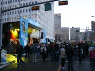 Festival-goers on a closed street in front of an outdoor stage at the 2010 Grey Cup Festival in Edmonton.