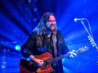 Alan Doyle performing on stage in Concord, New Hampshire, 2023.