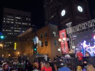 An outdoor stage lit at night with a crowd watching at the Grey Cup Festival in Edmonton, November 2018.