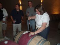 Wine being sampled from a barrel at a tasting, 2006.