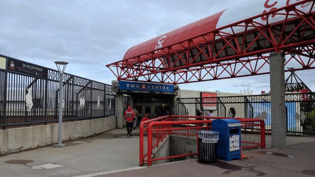 People walking toward the Saddledome in Calgary in September 2019.
